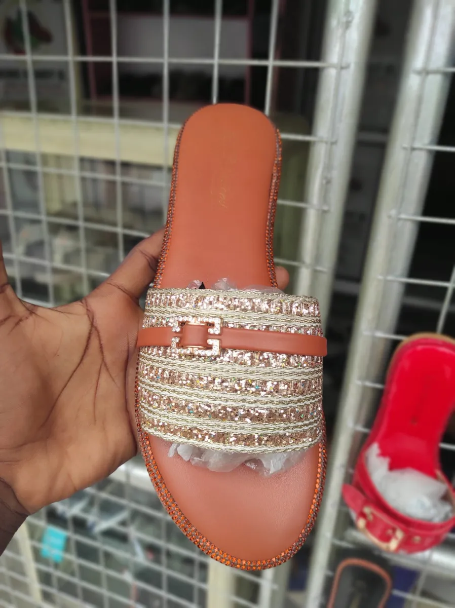 gold flat slip-on sandals