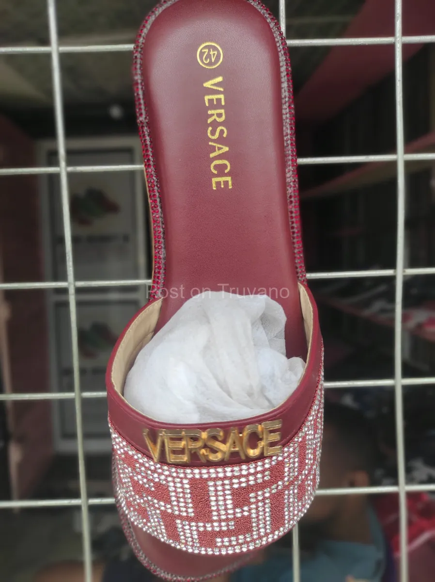 Red rhinestone-embellished Versace-branded low-heeled slip-on sandals